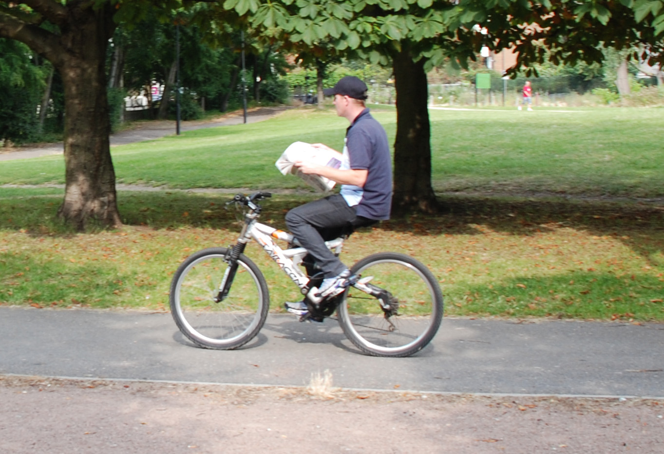 a man reading with biking